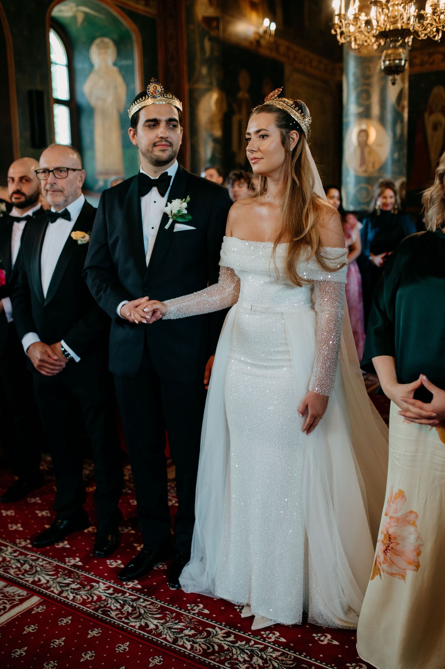 Bride and groom standing before the altar during their religious wedding ceremony