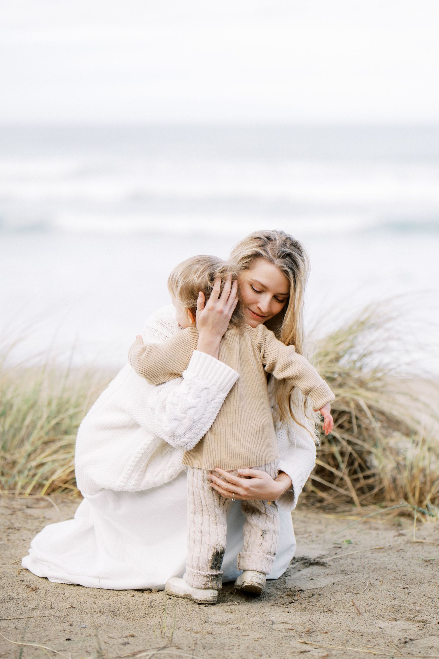 Serene image sequence in soft light showing intimate contemplative moments amidst coastal beach grass.