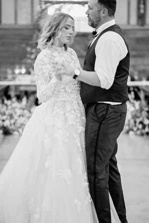 Black and white wedding dance captured in a series of romantic moments.