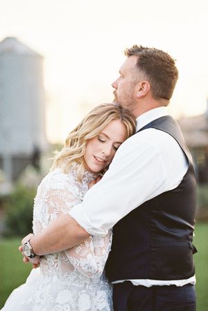 Intimate golden hour wedding portraits showcasing delicate lace details and tender moments.