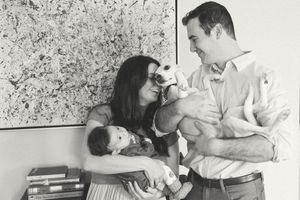 A collection of black and white photos showing tender moments between parents and their newborn baby.