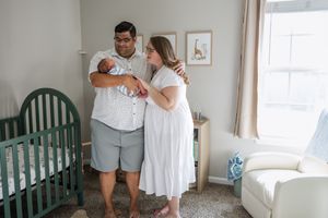 A series of tender moments captured in a nursery with soft natural light streaming through the windows.