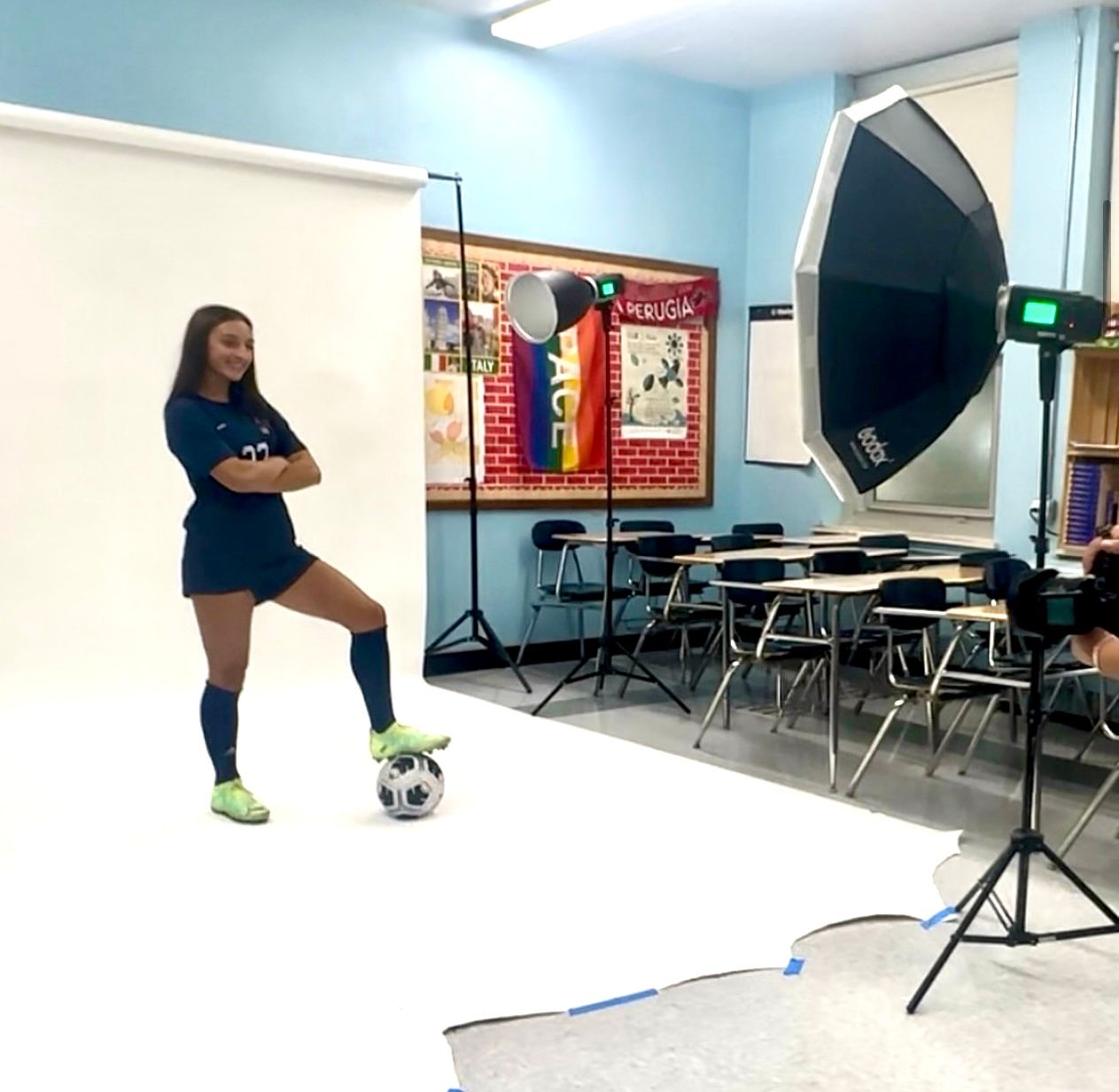 Behind the senes of high school sports media day in Oceanside, NY. Photos can be used to design and print team and individual banners.