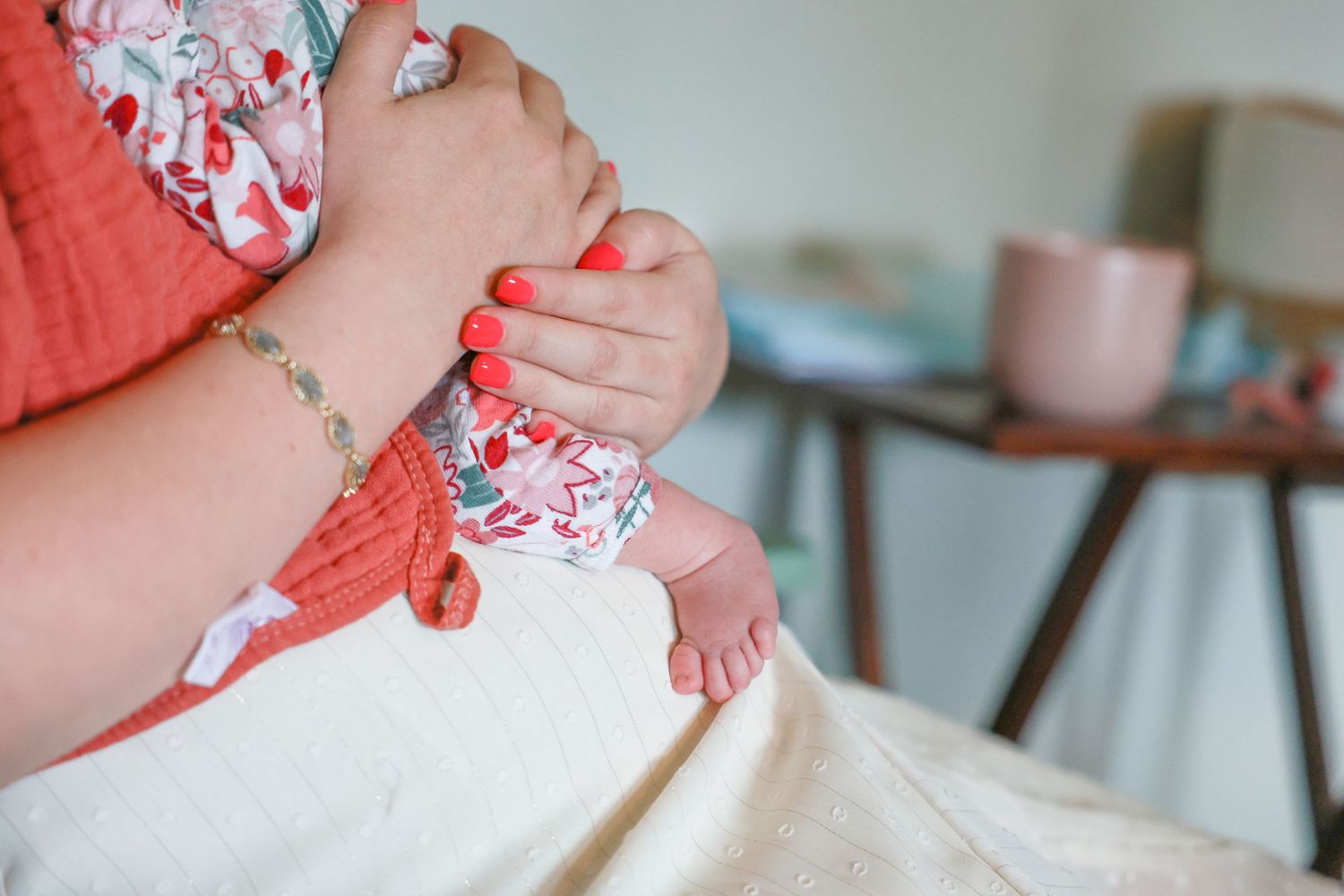 Close-up view of hands and small newborn feet Carlsbad Roswell Artesia Hobbs New Mexico NM lifestyle in home newborn pictures