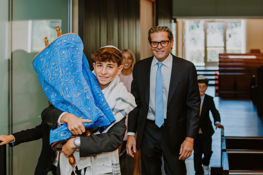 You man walking with his family at his San Diego County Bar Mitzvah