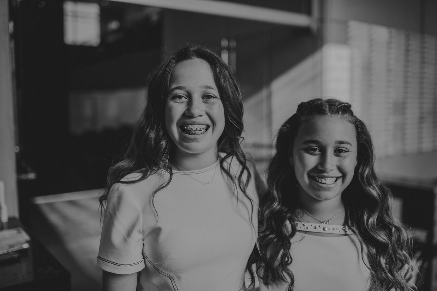 Black and white image of two girls at a San Diego Bat Mitzvah event