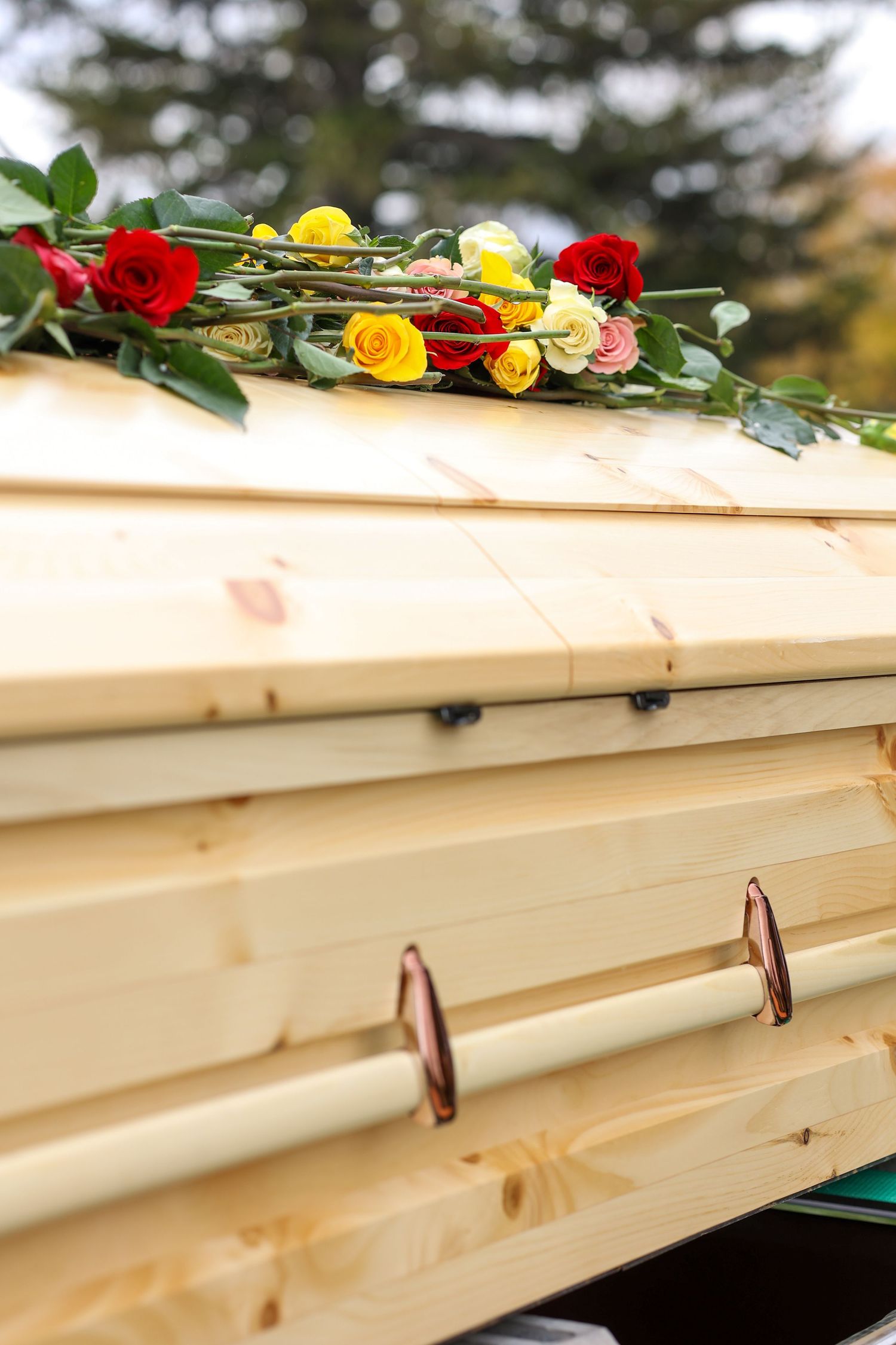 Flowers on wooden casket