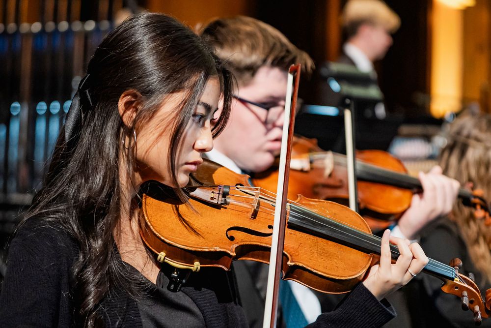 A girl playing Violin