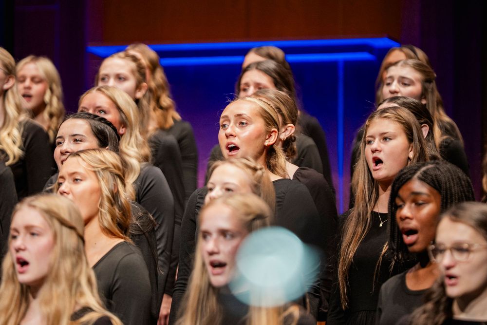 A group of choir kids singing