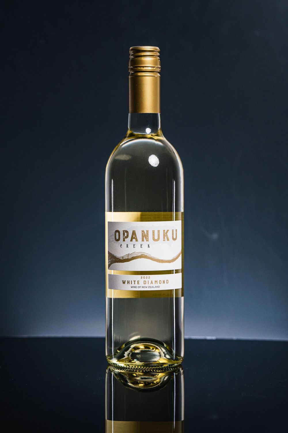 Professional Auckland product photography showcasing premium wine bottles and glasses, captured by a commercial photographer in New Zealand.
