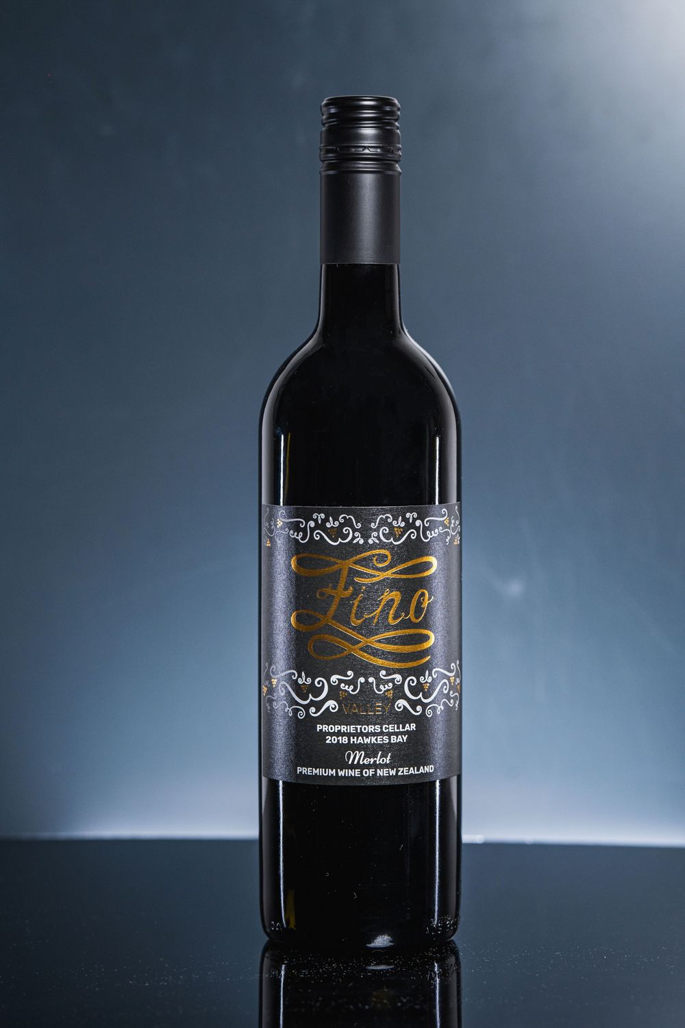 Professional Auckland product photography showcasing premium wine bottles and glasses, captured by a commercial photographer in New Zealand.