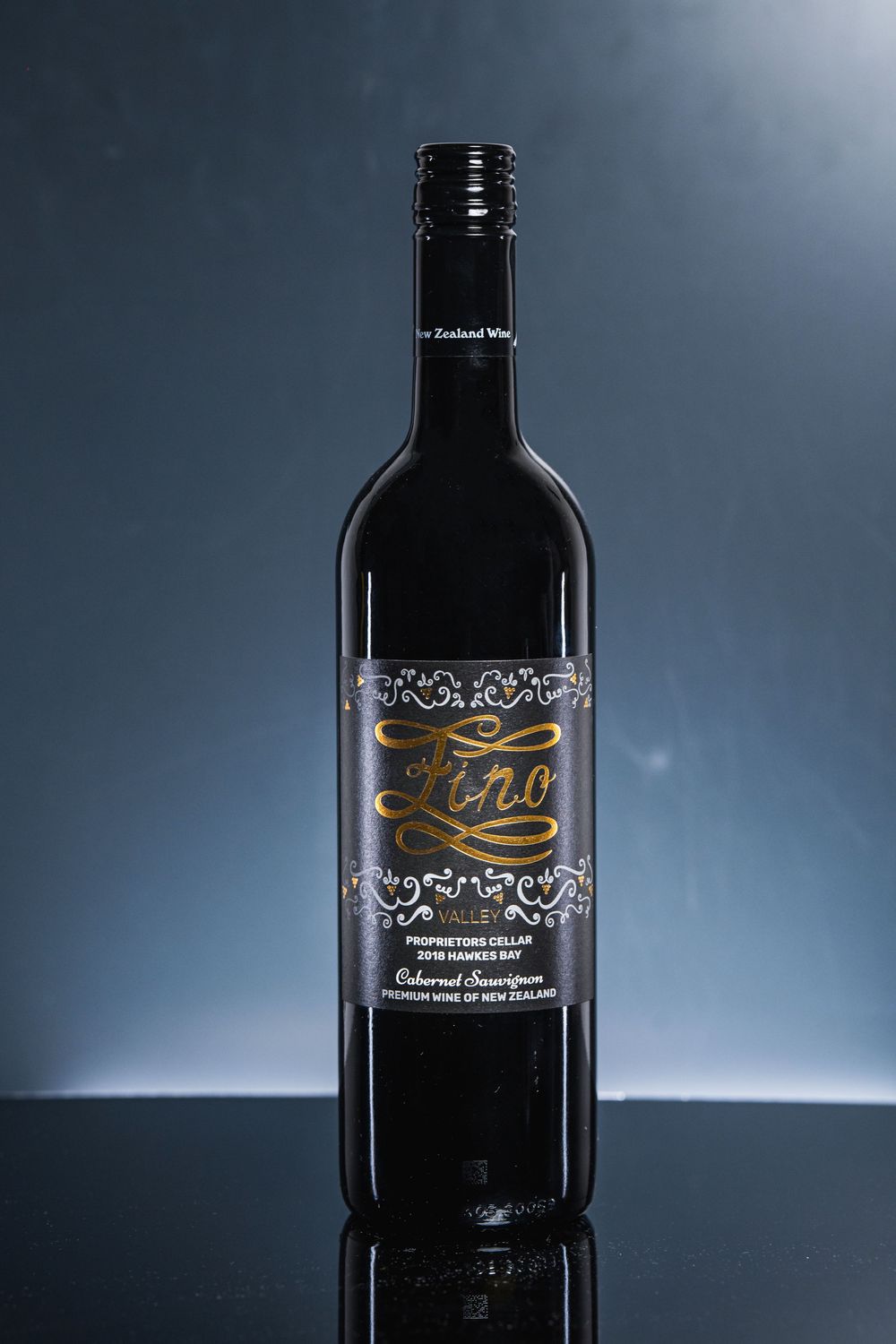 Professional Auckland product photography showcasing premium wine bottles and glasses, captured by a commercial photographer in New Zealand.