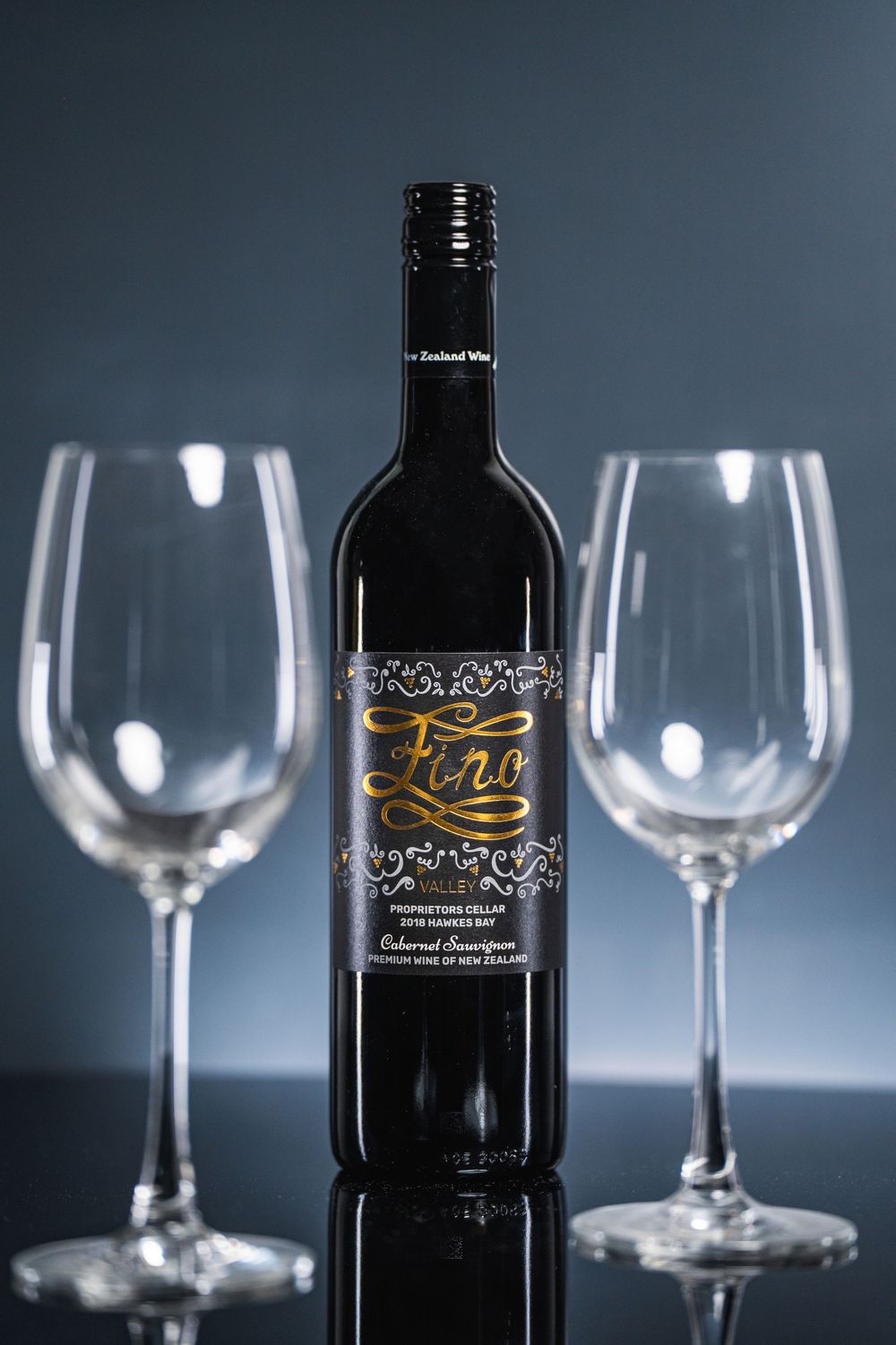 Professional Auckland product photography showcasing premium wine bottles and glasses, captured by a commercial photographer in New Zealand.