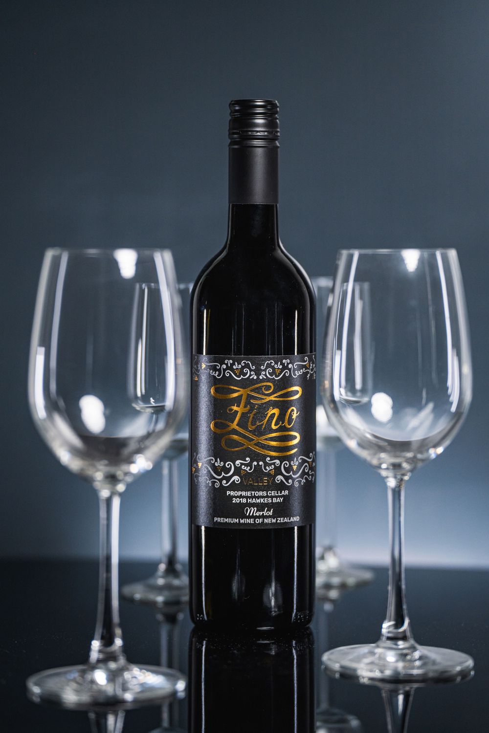 Professional Auckland product photography showcasing premium wine bottles and glasses, captured by a commercial photographer in New Zealand.