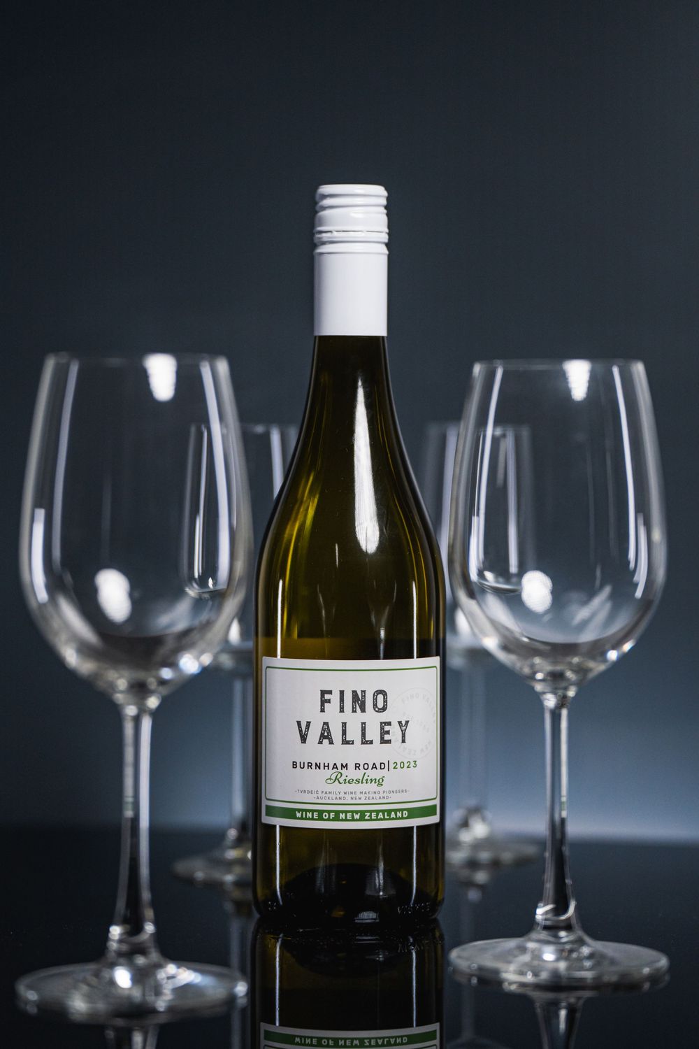 Professional Auckland product photography showcasing premium wine bottles and glasses, captured by a commercial photographer in New Zealand.