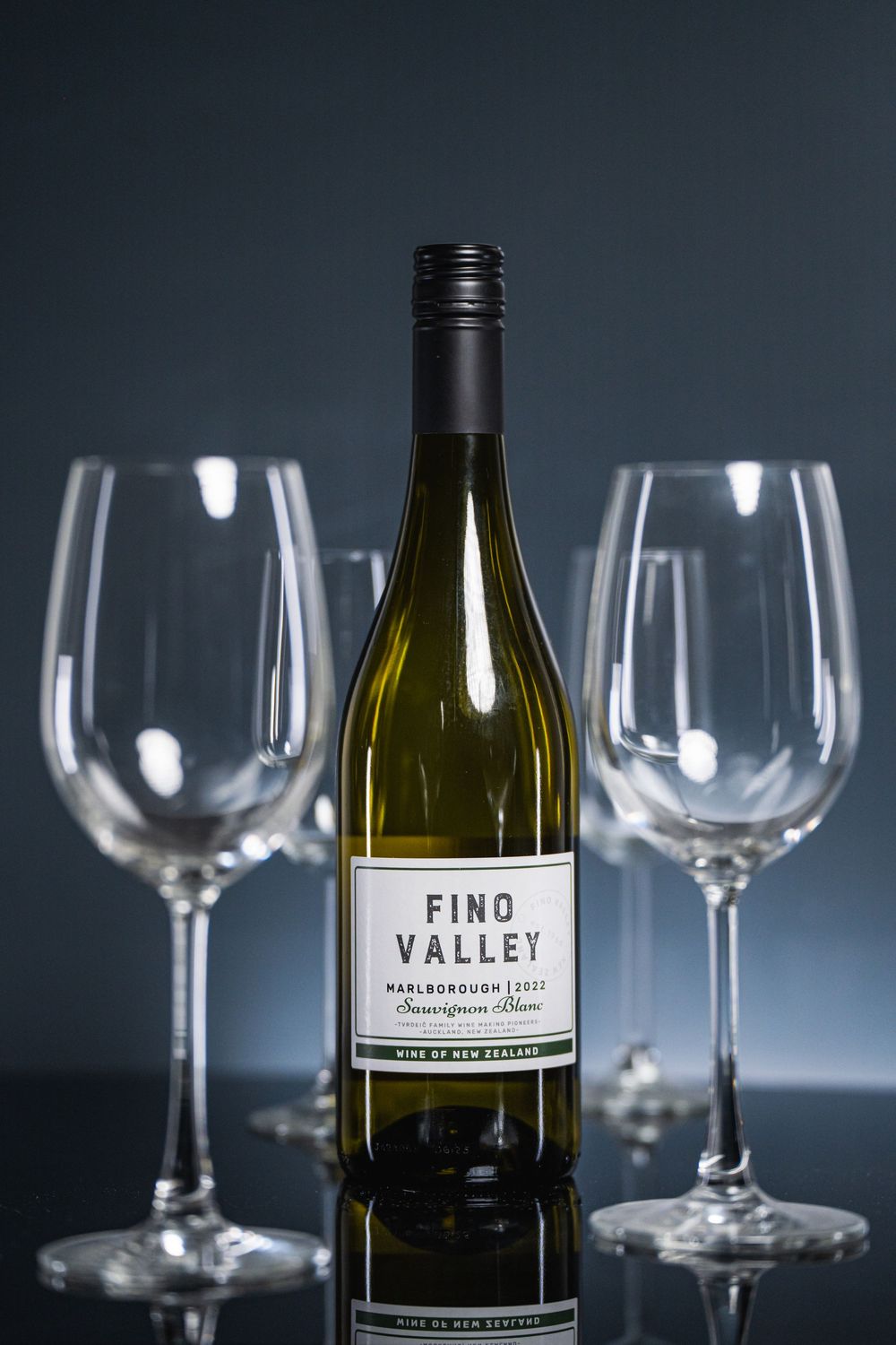 Professional Auckland product photography showcasing premium wine bottles and glasses, captured by a commercial photographer in New Zealand.