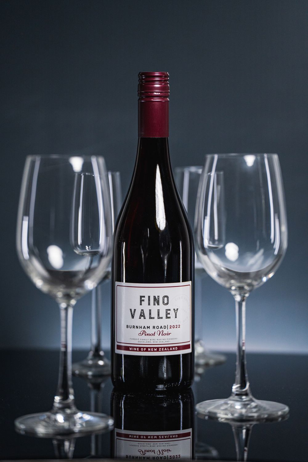 Professional Auckland product photography showcasing premium wine bottles and glasses, captured by a commercial photographer in New Zealand