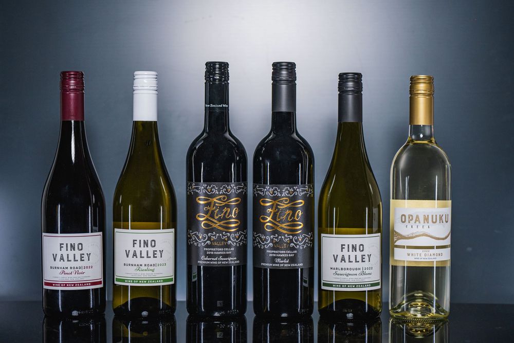Professional Auckland product photography showcasing premium wine bottles and glasses, captured by a commercial photographer in New Zealand.