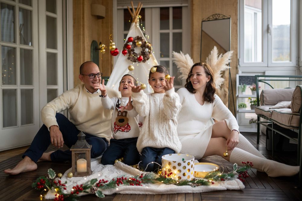 A series of holiday photos showing decorative Christmas scenes with lights, wreaths and indoor celebrations.