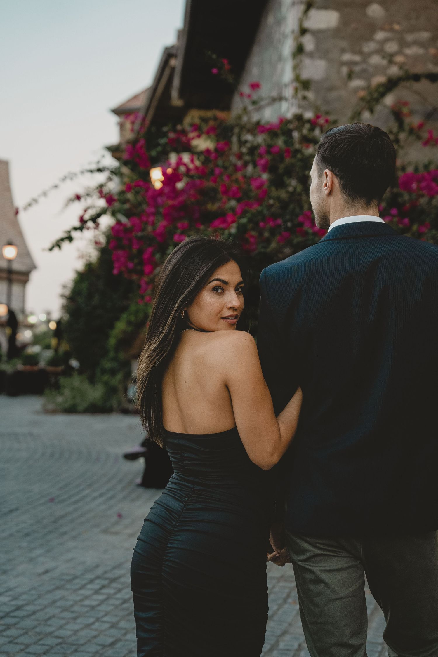 Evening lifestyle couple photography with festive lights