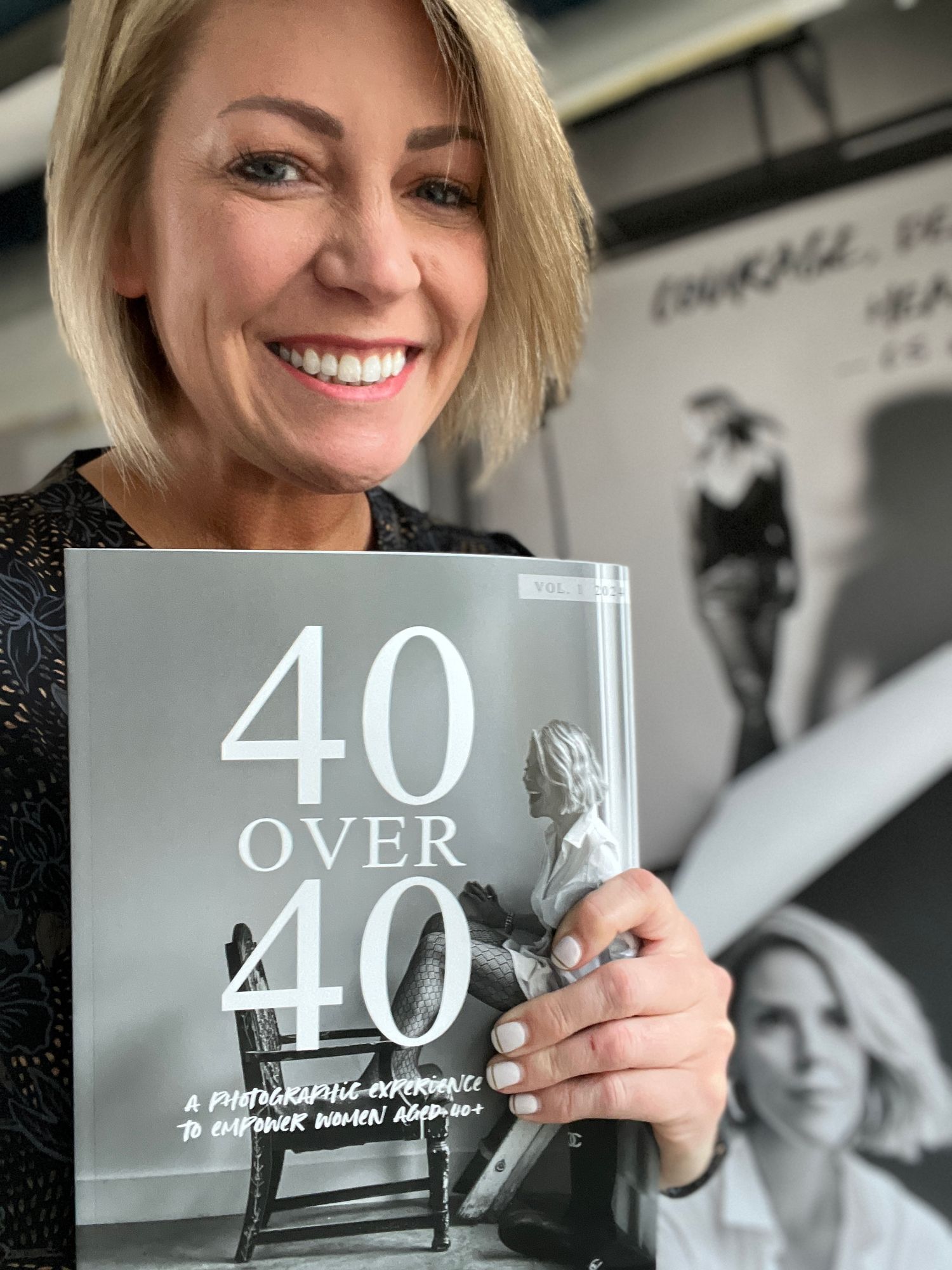 Woman smiling while holding clear acrylic signs with number 40 in different poses.