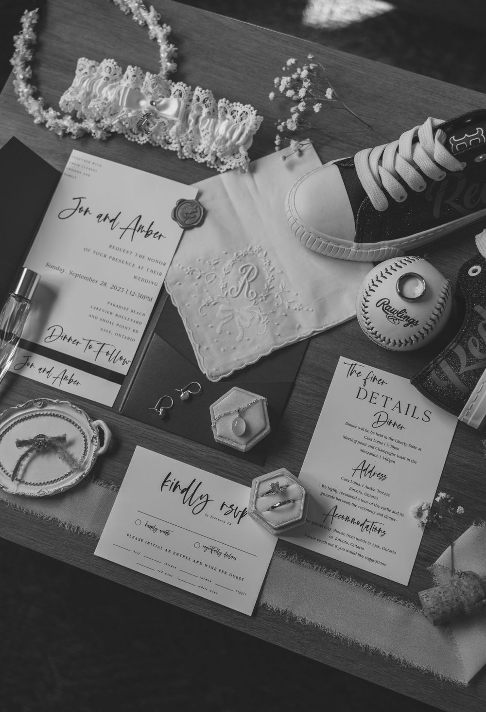 Wedding stationery and invitation suite laid out with elegant details in black and white.