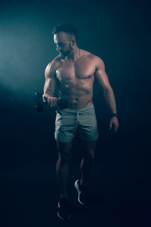 Utah male boudoir and fitness photography by Carl James Photography in Salt Lake City, masculine posing and professional studio lighting.