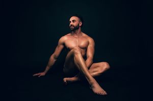 Utah male boudoir and fitness photography by Carl James Photography in Salt Lake City, masculine posing and professional studio lighting.