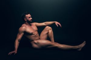 Utah male boudoir and fitness photography by Carl James Photography in Salt Lake City, masculine posing and professional studio lighting.