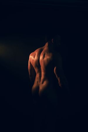 Utah male boudoir and fitness photography by Carl James Photography in Salt Lake City, masculine posing and professional studio lighting.