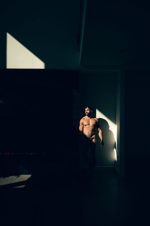 Utah male boudoir and fitness photography by Carl James Photography in Salt Lake City, masculine posing and professional studio lighting.
