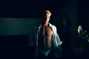 Utah male boudoir and fitness photography by Carl James Photography in Salt Lake City, masculine posing and professional studio lighting.