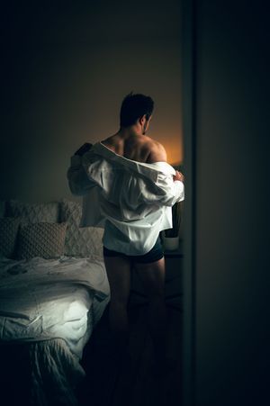 Utah male boudoir and fitness photography by Carl James Photography in Salt Lake City, masculine posing and professional studio lighting.