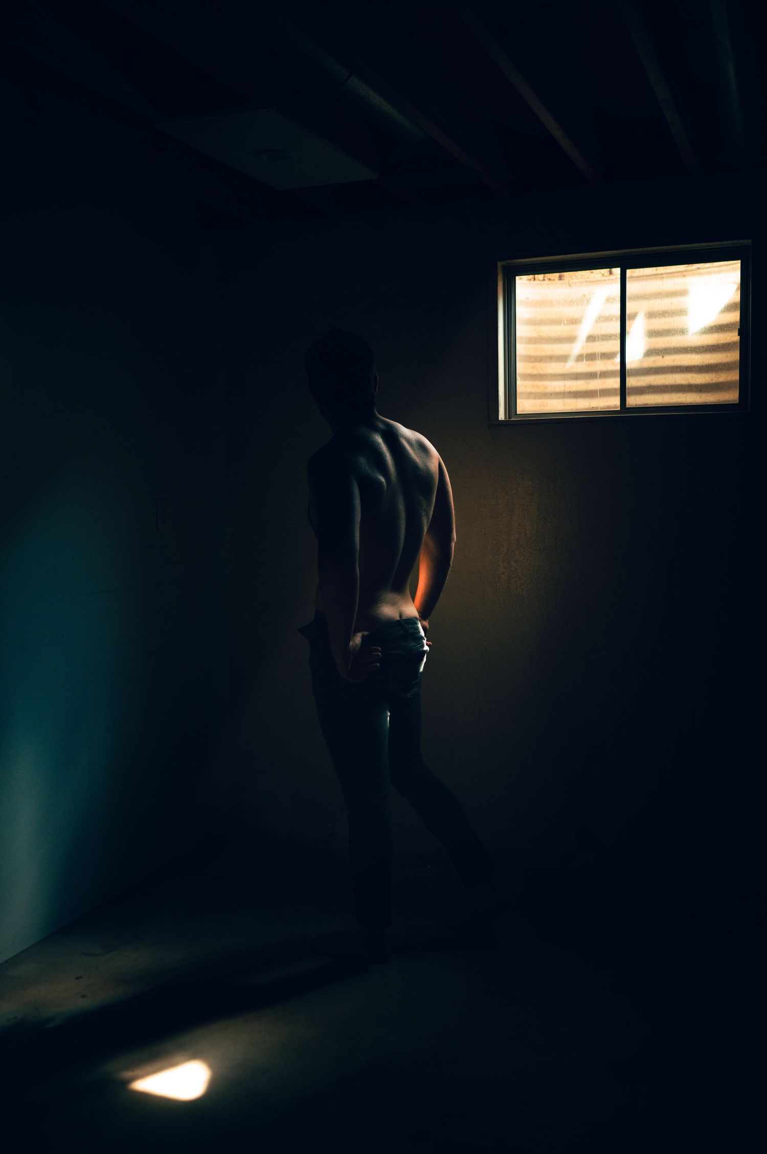 Utah male boudoir and fitness photography by Carl James Photography in Salt Lake City, masculine posing and professional studio lighting.