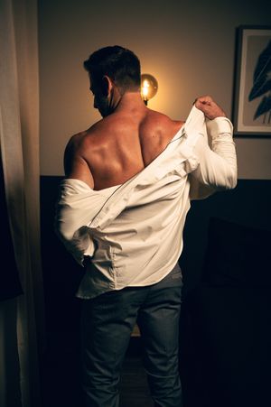 Utah male boudoir photography by Carl James Photography in Salt Lake City, masculine posing and professional studio lighting.