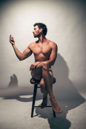 Utah male boudoir photography by Carl James Photography in Salt Lake City, masculine posing and professional studio lighting.