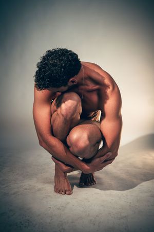 Utah male boudoir and fitness photography by Carl James Photography in Salt Lake City, masculine posing and professional studio lighting.