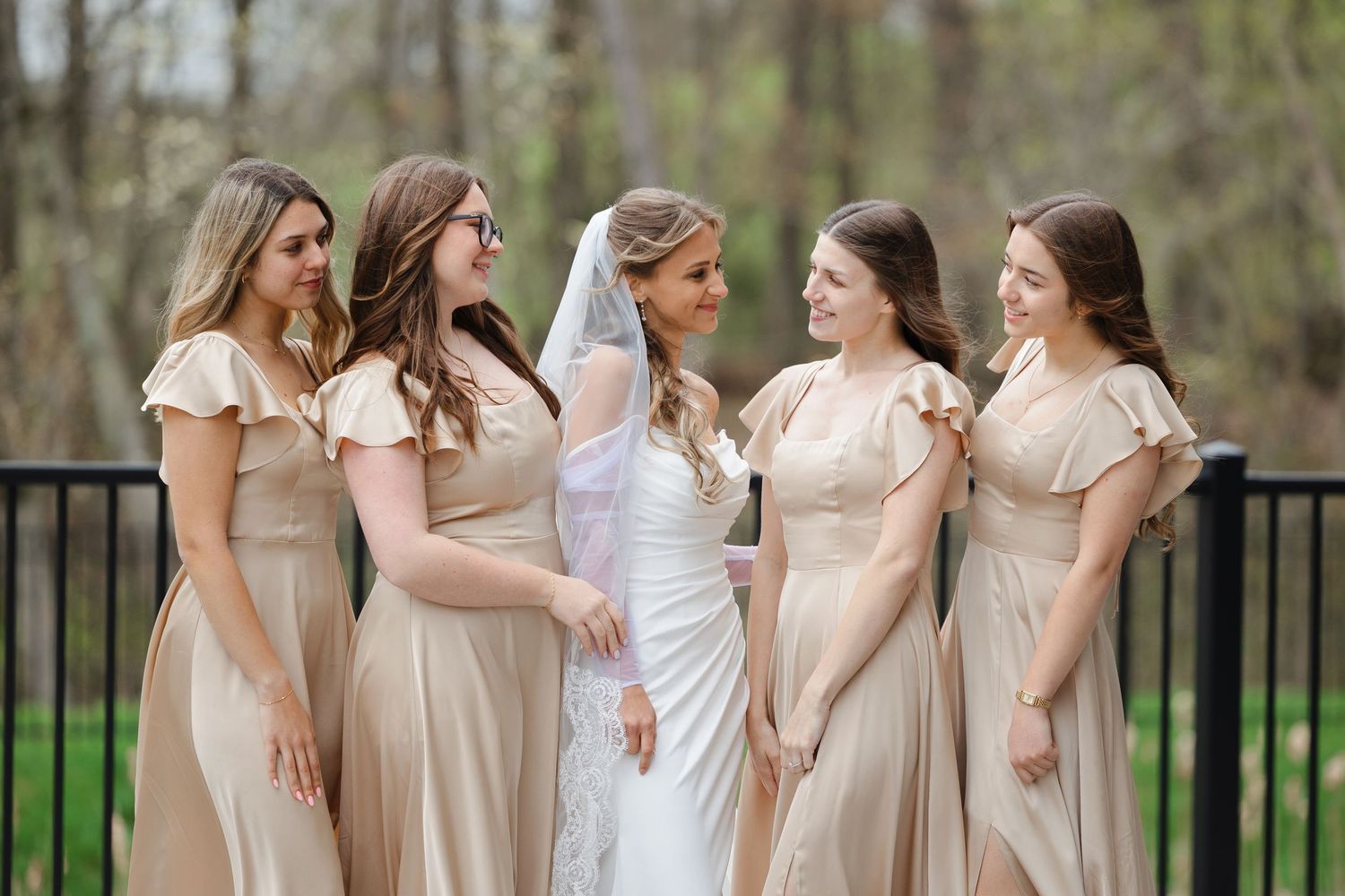 Bride with bridesmaids outside Reserve at Stone Creek in North Canton photographed by Tom Forrest from Hudson, Ohio.