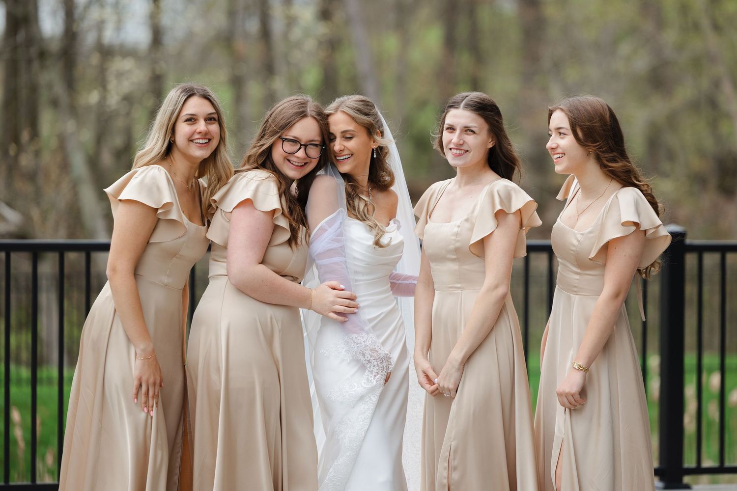 Bride with bridesmaids outside Reserve at Stone Creek in North Canton photographed by Tom Forrest from Hudson, Ohio.