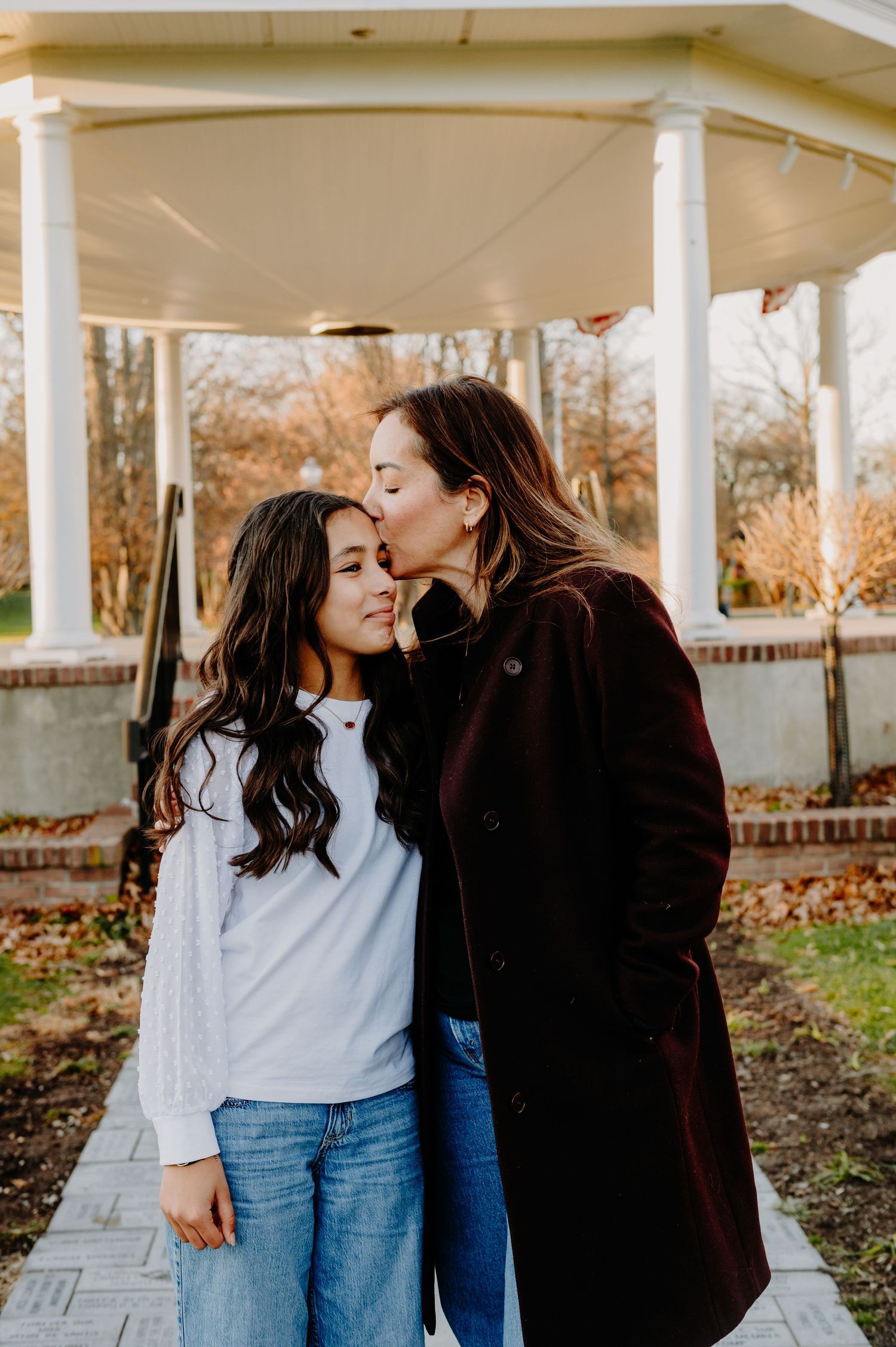 Family walking together through a park in the winter time in New Jersey. Family Sessions in New Jersey. Outdoor family photographer.