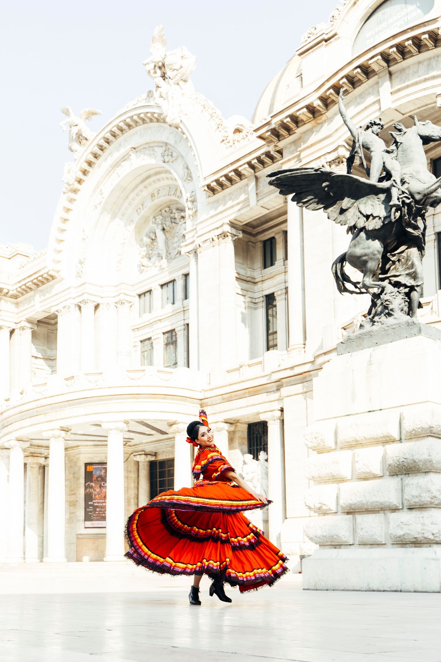 Professional Ballet Folklórico photography capturing cultural dance outside Palacio de Bellas Artes