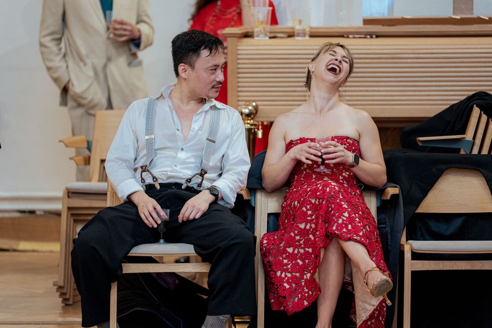 Dance partners enjoying a lively moment during their practice session.