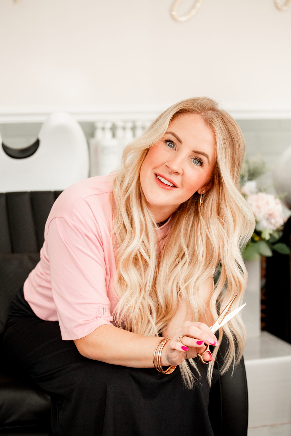 Casual portrait session in pink top against modern home decorSalon Branding Photography in St Austell, Cornwall - Caribou