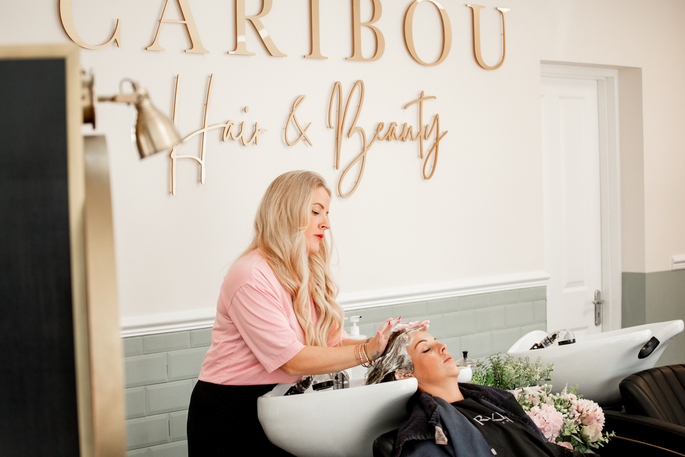 Interior view of Caribou salon with modern decor and styling stations. Salon Branding Photography in St Austell, Cornwall - Caribou