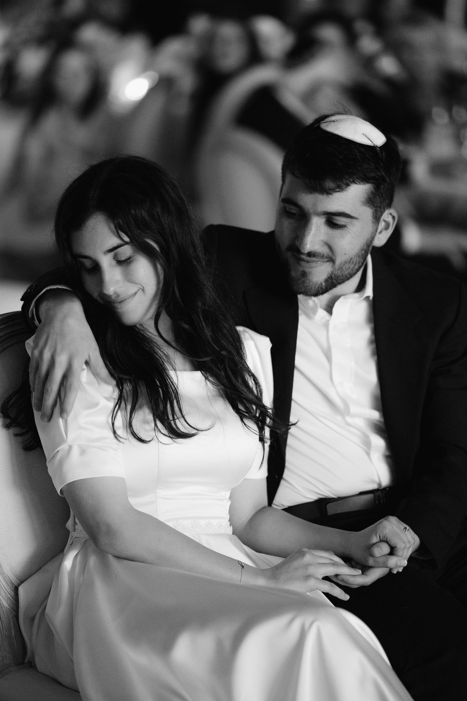 A romantic black and white photo sequence shows a couple in formal attire sharing intimate moments together.