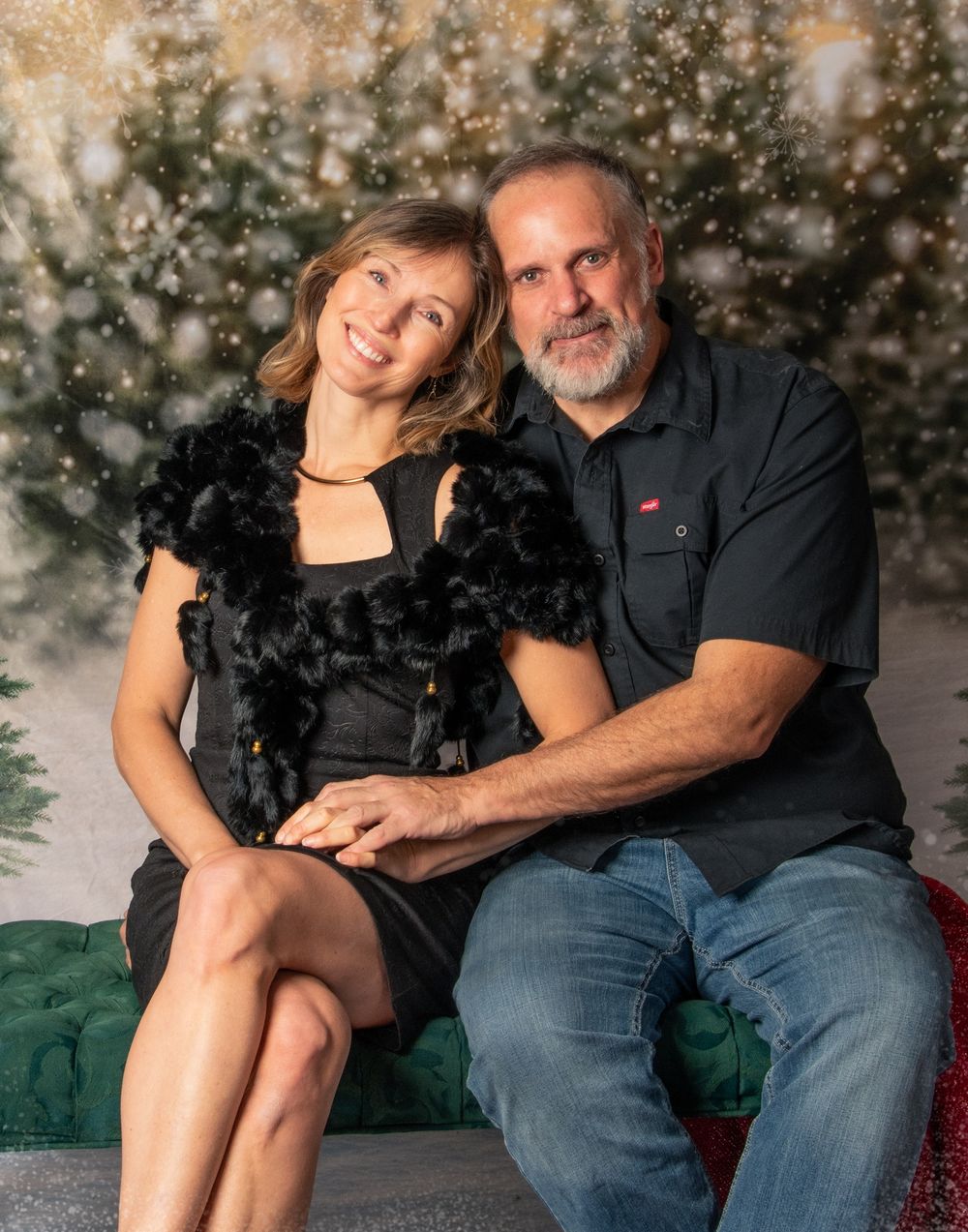 A couple poses together in a series of intimate portraits against a bokeh light background.