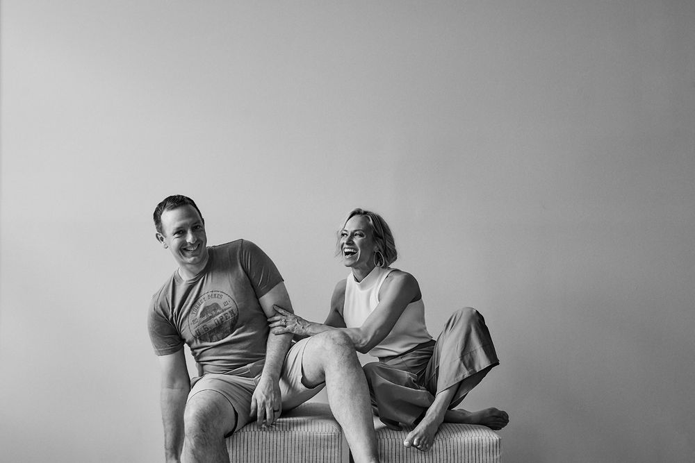 Black and white series showing people sitting and interacting casually.