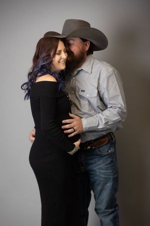 A romantic series of photos showing a couple embracing in black and white clothing against a neutral background.