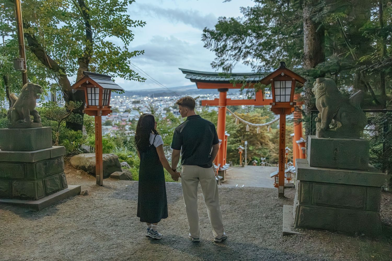 Engagement photoshoot around traditional orange torii gate of Chureito Pagoda