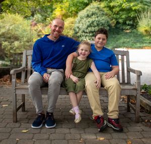 A series of candid photos showing people sitting together on a wooden bench in a garden setting.